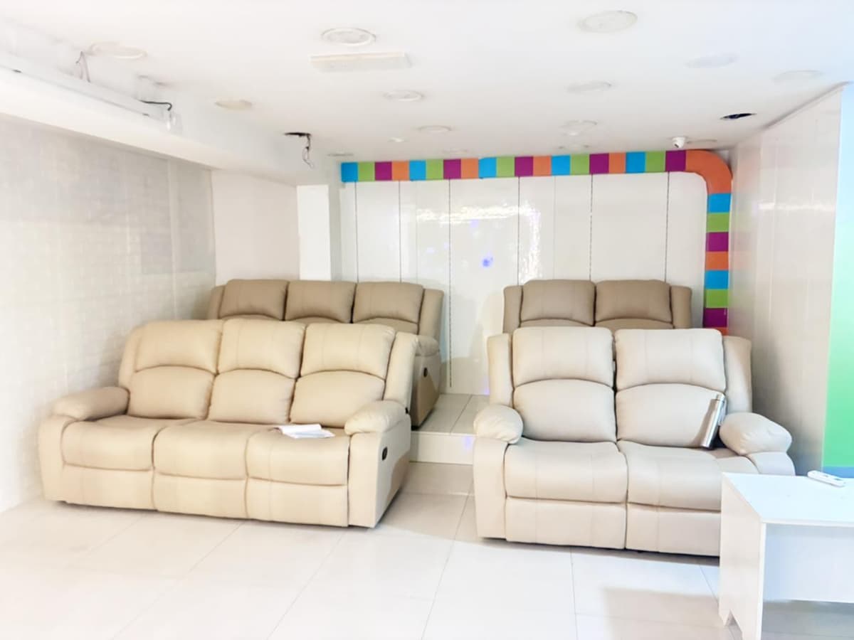 Spacious party hall with recliners