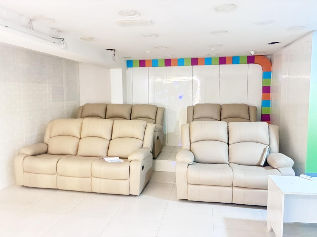 Spacious party hall with recliner sofas